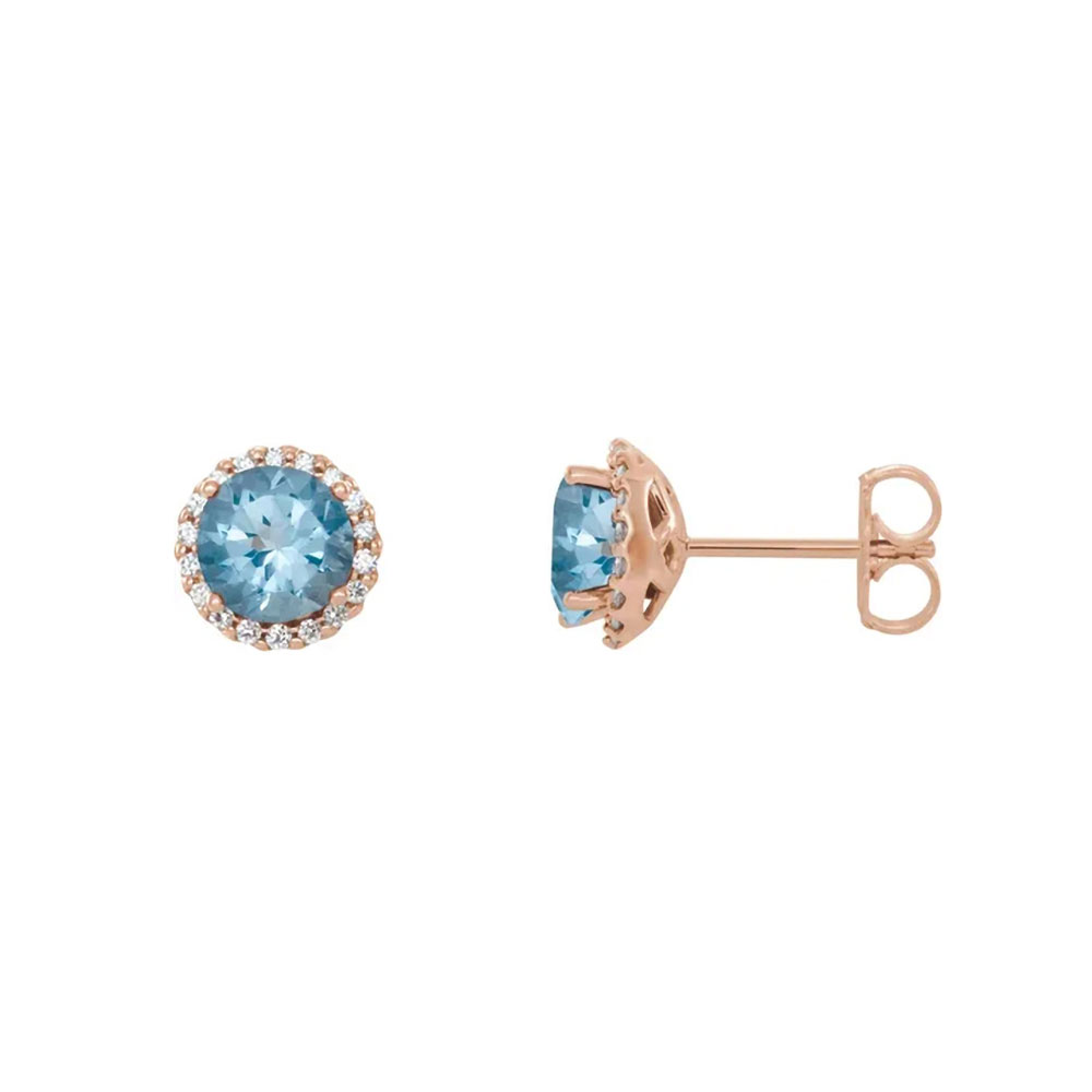 Dive into elegance with these 14K gold earrings, featuring serene aquamarine encircled by a sparkling diamond halo.