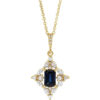 A sophisticated 14k yellow gold Necklace featuring a radiant blue sapphire centerpiece surrounded by twinkling diamonds.