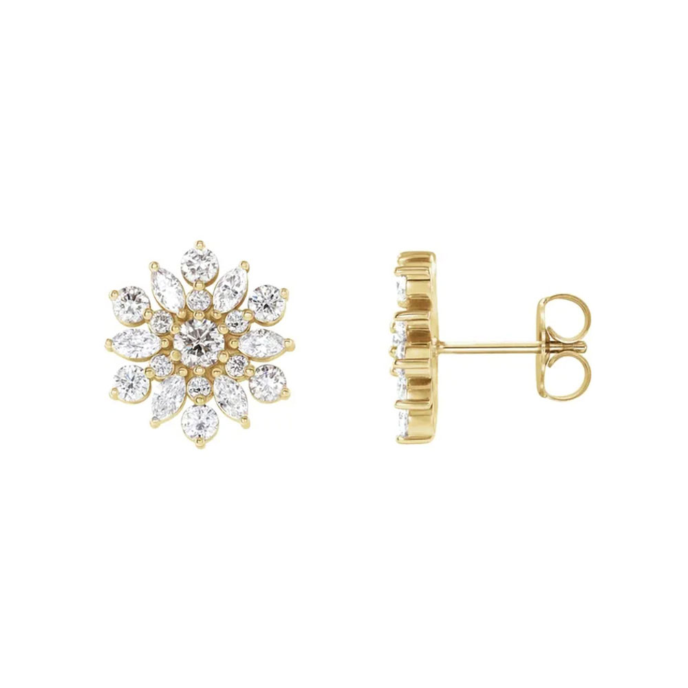 An arctic spark lives in these diamond-encrusted snowflake earrings, 14k gold reflecting the morning frost's glow.