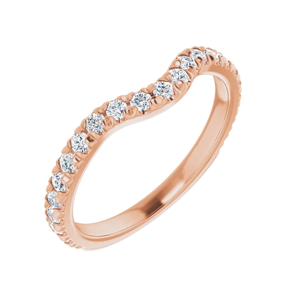 Discover the elegance of this bridal band, designed to complement our 0.70 carat round diamond engagement ring.