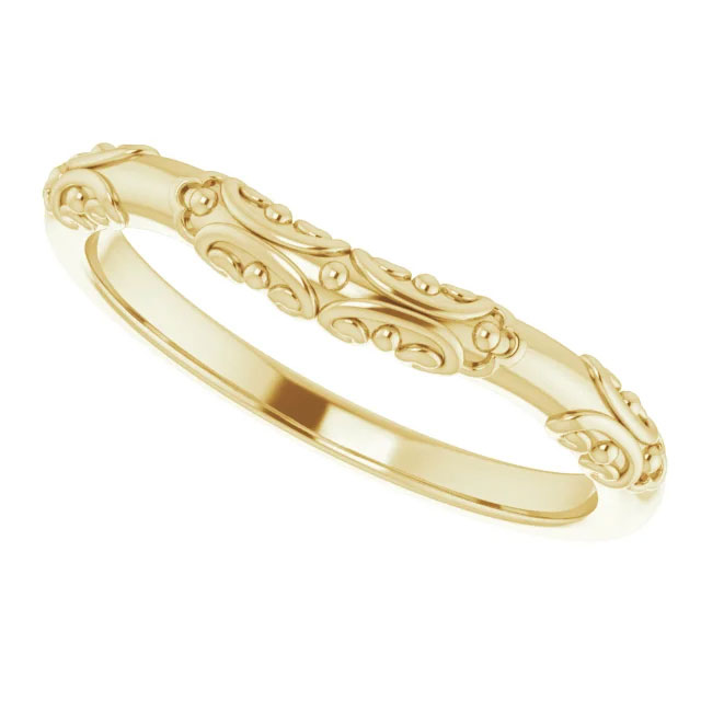 This 14k gold wedding band's sleek design is crafted to pair beautifully with your bridal ring, enhancing its splendor.