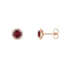 Diamond-encircled ruby studs set in 14K gold, a harmonious blend of color and light for a timeless accessory.