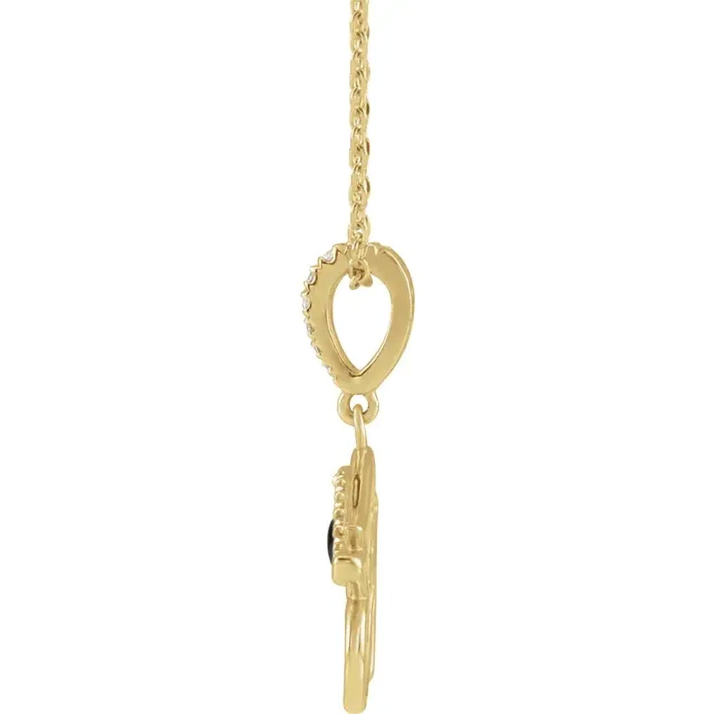 Luxury 14k yellow gold necklace featuring the Egyptian Eye of Horus, reflecting heritage and opulence, against a white background.