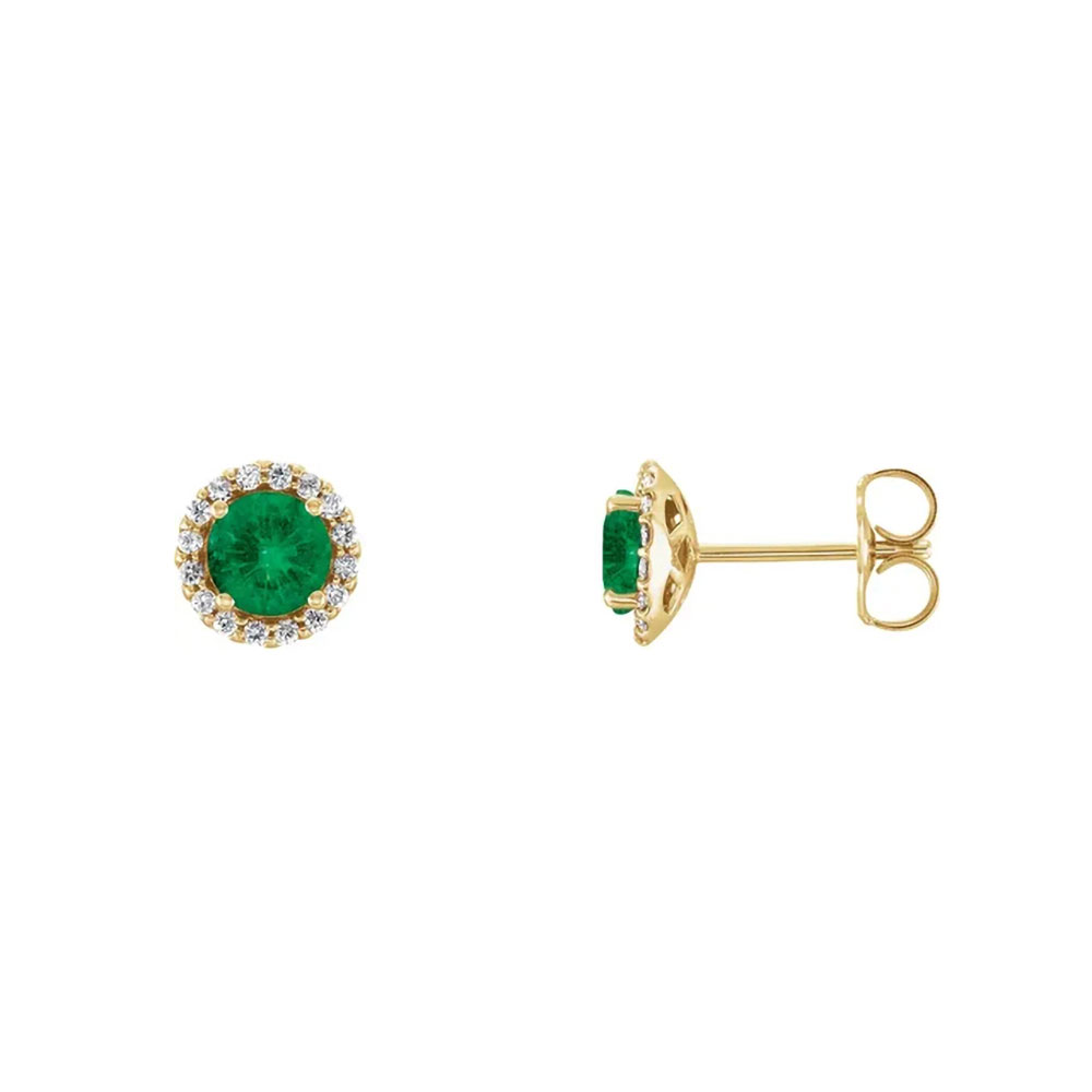 A celestial halo of diamonds enhances these emerald earrings, set in a luxurious 14K gold.