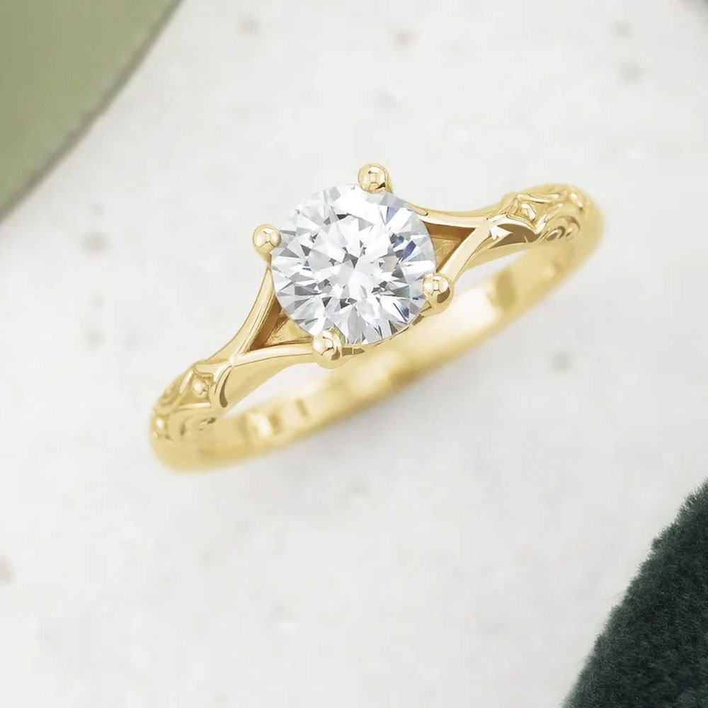 Luxury redefined with a sparkling 1 carat diamond nestled within the warm embrace of a 14k gold setting.