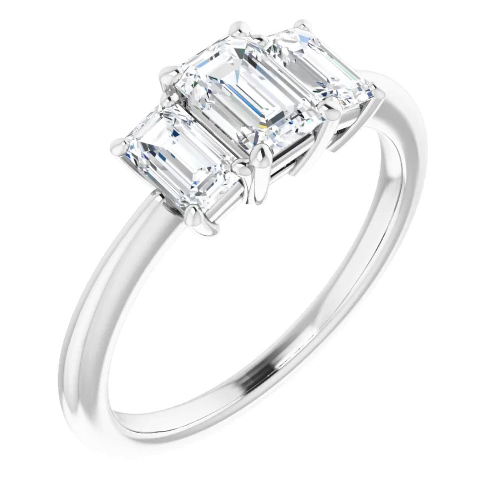 The engagement ring that speaks volumes: three emerald-cut diamonds, promising a future as bright as their sparkle.