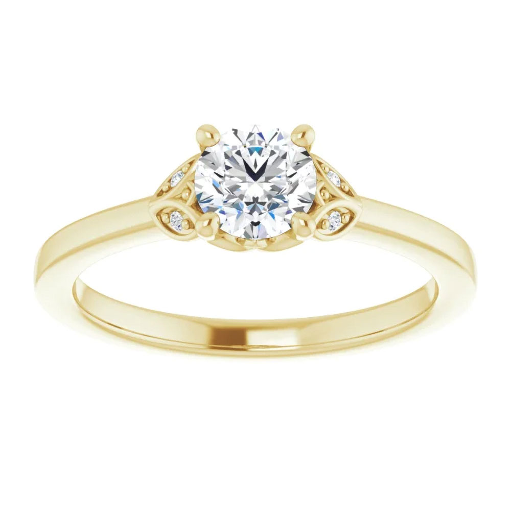 A modern twist on a classic, this 0.5 carat round diamond engagement ring is designed for the contemporary couple.