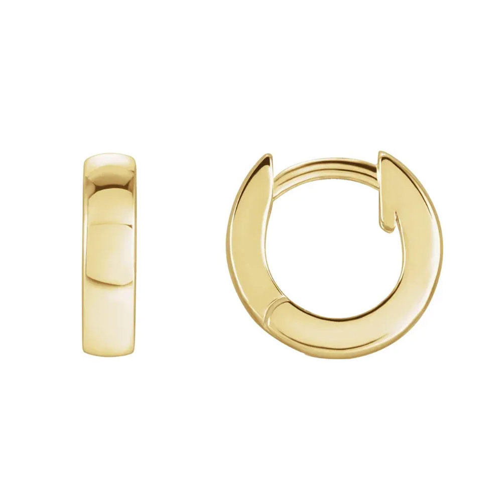 Refined 14k gold huggie earrings that offer a subtle shine for everyday elegance.