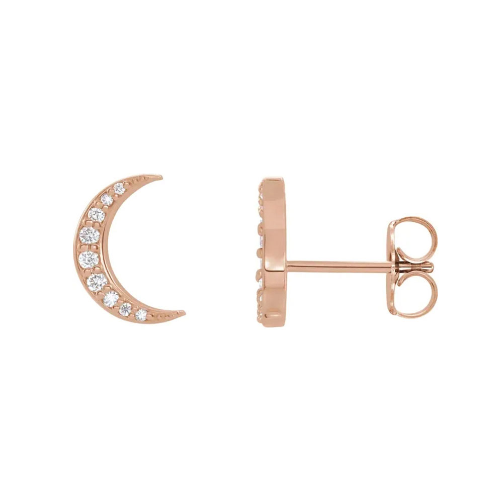 Twinkling diamonds embellish these 14k gold crescent earrings, reflecting the moon's own light