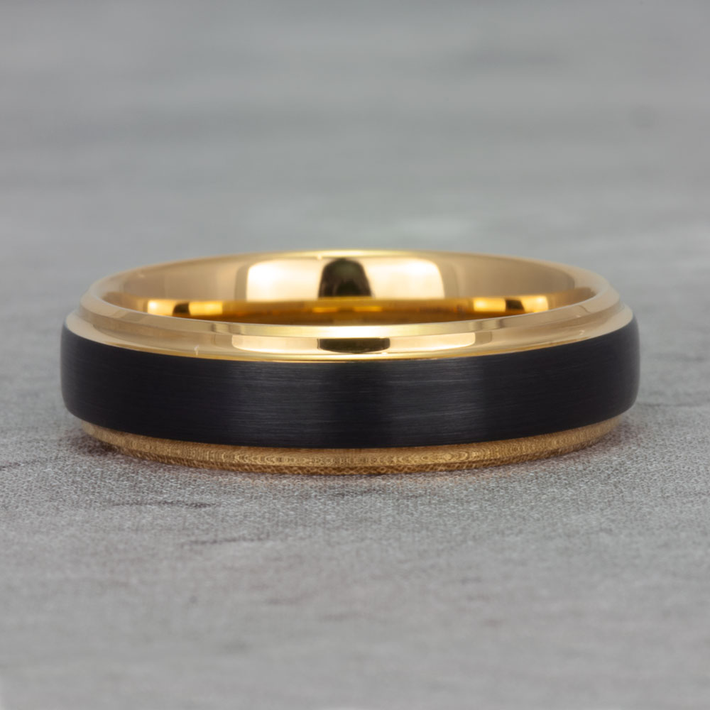 Classic view of our black tungsten & 18k gold wedding ring, highlighting its refined design and timeless appeal.