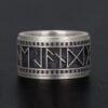 A customizable rune wedding band, crafted to symbolize eternal love and ancient wisdom.