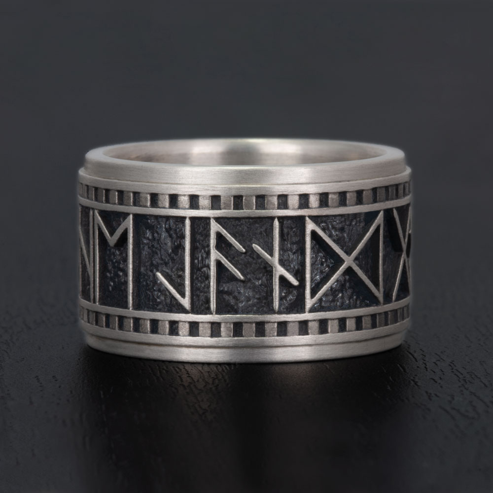 A customizable rune wedding band, crafted to symbolize eternal love and ancient wisdom.